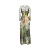 Long-sleeved maxi dress with sheer, silver-toned beaded overlay and an abstract print in green, yellow, orange, and black. Ba