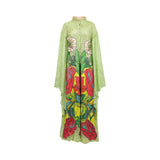 Lime green shimmery kaftan dress with a high collar and button-front. Features a vibrant floral print in red, yellow, and whi