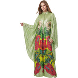 Lime green sequined dress with a vibrant red, yellow, and green floral print, high collar, and wide sleeves.