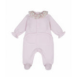 Back view of the Jules & Juliette Paris pink babygrow showing the snap-button fasteners along the back and the seat area for easy diaper changes