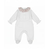 Back view of the Jules & Juliette Paris white babygrow showing the snap-button fasteners along the back and the seat area for easy diaper changes.