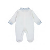 Back view of a Jules & Juliette Paris baby footed romper. The front shows a white long-sleeve onesie with a blue striped collar, two striped front pockets, and embroidered elephant details. The back view features a clean white design with the striped collar visible.