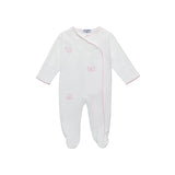 Front view of a white Jules & Juliette Paris babygrow featuring pink scalloped trim and three embroidered pink butterflies.