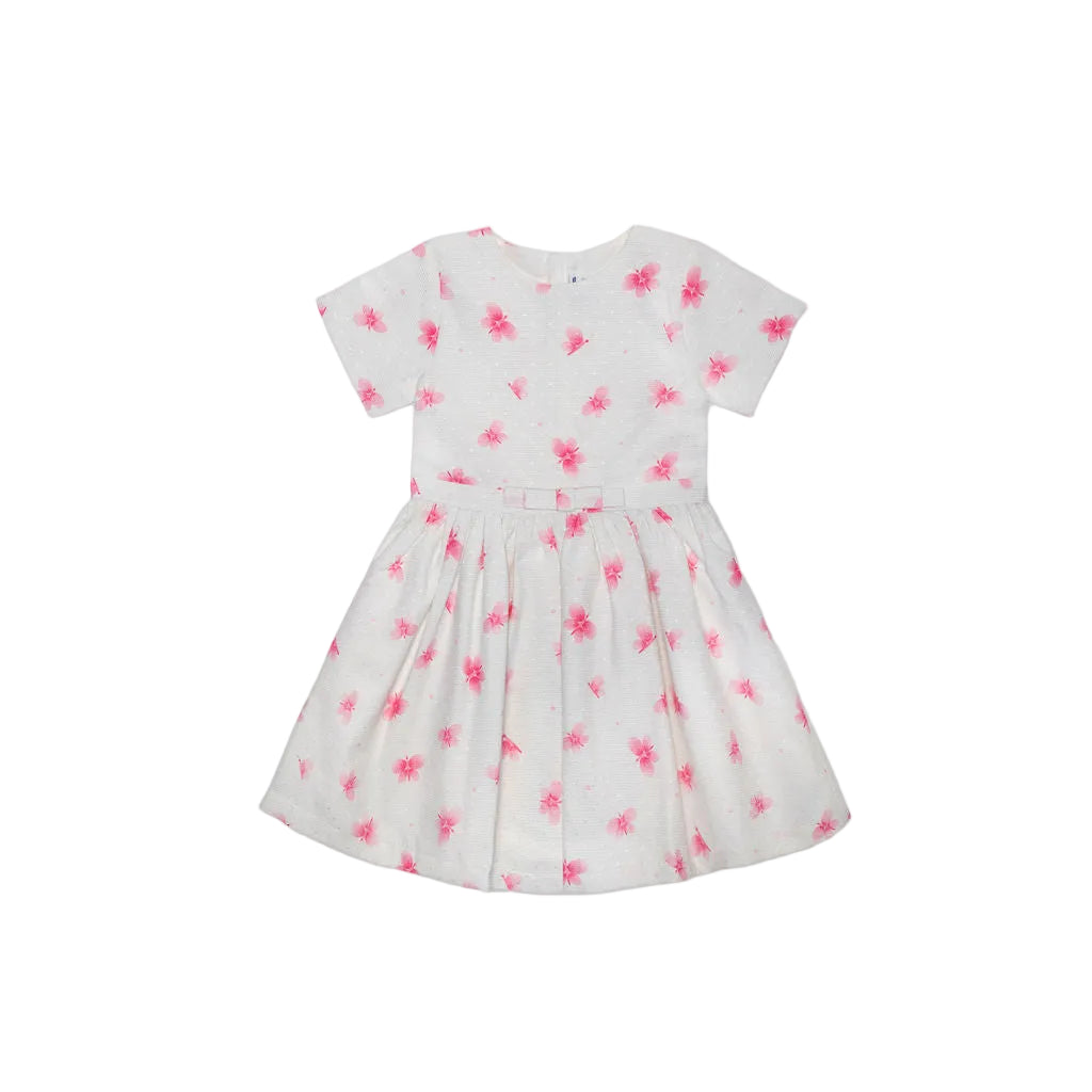 A girls' short-sleeve ivory dress by Jules & Juliette Paris featuring an all-over pink butterfly print, a pleated skirt, and a small bow at the waist.