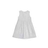 Back view of a white pleated sleeveless dress for girls showing the clean round neckline and concealed zipper closure.