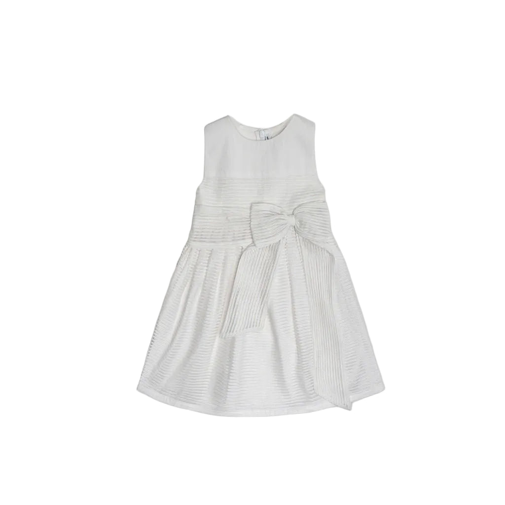 Front view of a white sleeveless girls' dress by Jules & Juliette Paris featuring horizontal pleats and a large decorative bow on the waist.