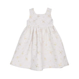 Front view of a Jules & Juliette Paris girls' sleeveless off-white jacquard dress featuring a metallic gold floral pattern and a gathered skirt.