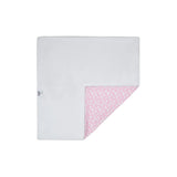 A square baby blanket featuring a dual-layer design. One side is a clean, solid white plush fabric, while the reverse side features a light pink print with white clouds and hot air balloon motifs.