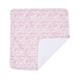 A full, flat view of the square swaddle blanket featuring a rose-pink pastoral Toile de Jouy scene printed on white fabric.