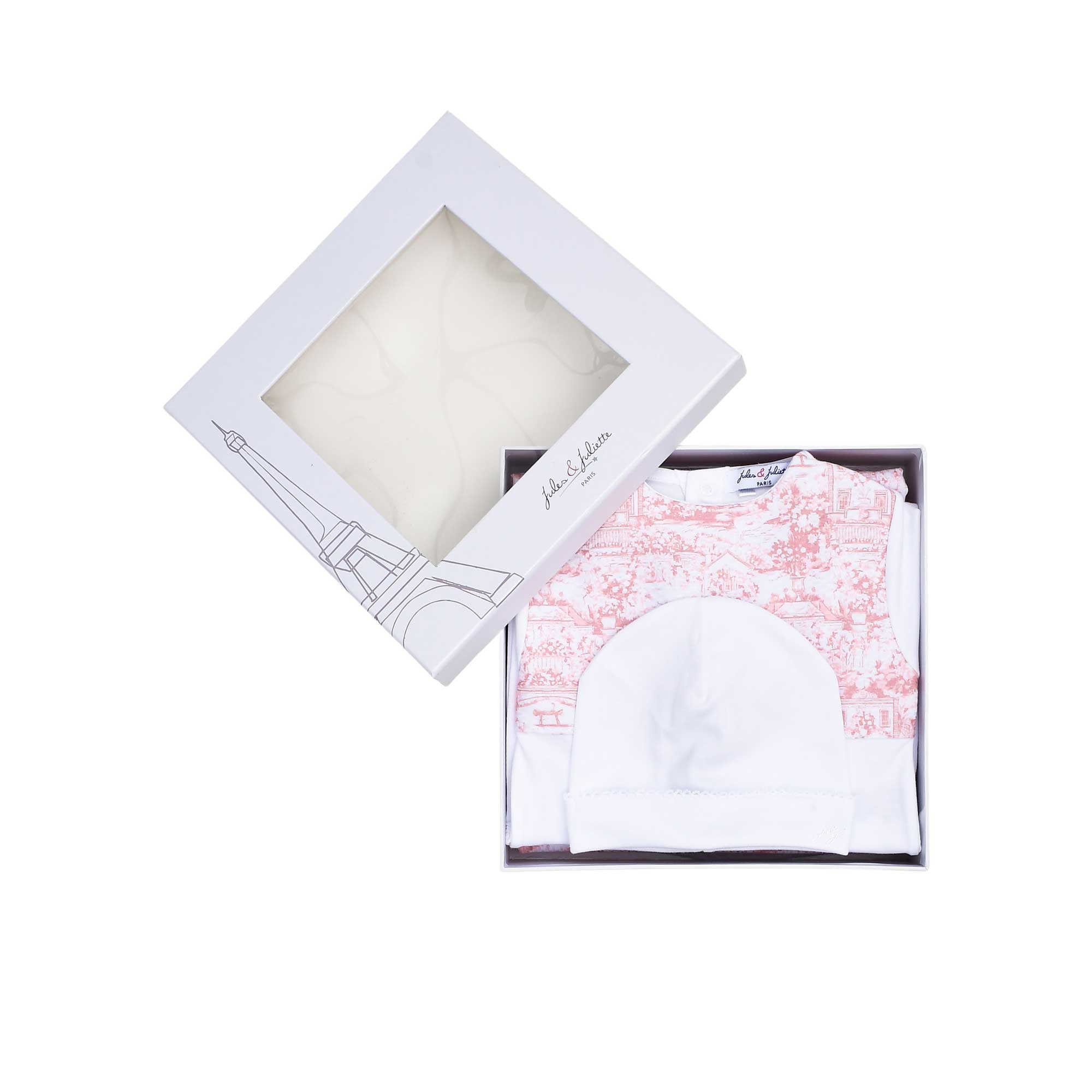 Signature Jules & Juliette Paris gift box with an Eiffel Tower graphic and ribbon, displaying the pink Toile de Jouy baby set inside.