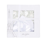 Signature white Jules & Juliette Paris gift box with a window showing the wildflower set inside, finished with a ribbon and Eiffel Tower graphic.