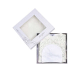 Signature white Jules & Juliette Paris gift box with a window showing the wildflower set inside, finished with a ribbon and Eiffel Tower graphic.