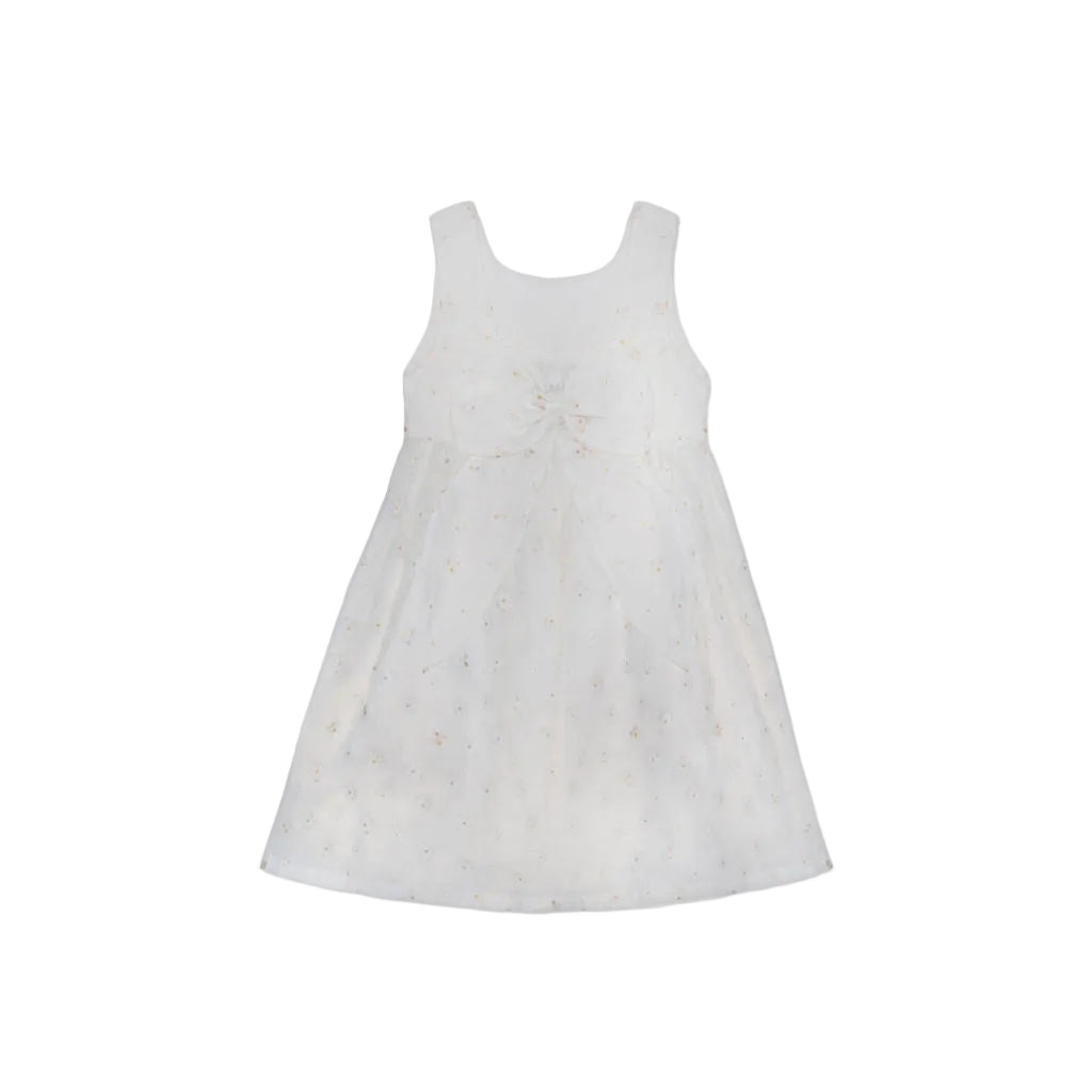 Back view of the Jules & Juliette Paris white embroidered dress, highlighting the large decorative bow at the center back.