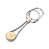 Silver-toned stainless steel keyring with a coiled body, gold-toned connector, and a gold-toned coin featuring the Saint Hono
