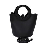Karisma Sculptural Grained Satchel, where avant-garde geometry meets classic luxury.