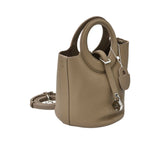 Karisma Sculptural Grained Satchel, where avant-garde geometry meets classic luxury.