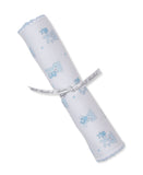 White burp cloth with light blue teddy bear and star print, light blue scalloped trim, tied with a white 'kissy kissy' ribbon