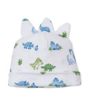White baby beanie with multicolor dinosaur print, folded brim, and three soft spikes on top.