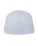 Light blue baby beanie hat made of soft knit fabric, with a folded brim and a visible seam on top.
