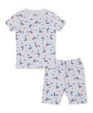 White short-sleeved pajama set with blue whales in red-striped swim rings, blue fish, and light blue dots.