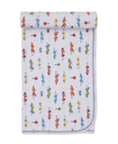 White baby blanket with a colourful pattern of racing cars, stop signs, and checkered flags, featuring a blue stitched border
