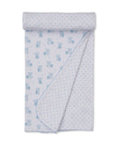 White blanket with light blue teddy bear print on one side, light blue star print on the reverse, and scalloped trim.