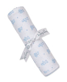 White blanket with light blue teddy bear and paw print pattern, tied with a white 'kissy kissy' ribbon. Features a light blue