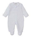 White Kissy Kissy Kids full-front zip sleepsuit with light blue star pattern and integrated footies.