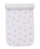 Pink and white burp cloth with a repeated pattern of light pink teddy bears and small pink hearts, featuring a scalloped pink