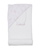 White hooded towel with pink celestial pattern on hood and matching pink-trimmed wash mitt.