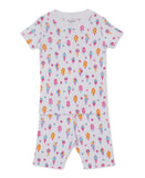 White baby pyjama set with short-sleeved top and shorts, featuring a multicolour print of ice creams, popsicles, and flowers.
