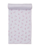 Pink and white new born blanket with an all-over pattern of pink teddy bears and hearts, featuring a scalloped edge.
