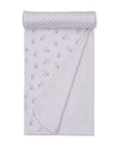 White blanket with pink teddy bear and heart print on one side, pink heart print on the reverse, and pink scalloped trim.