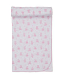 Pink and white baby blanket with an all-over pattern of pink teddy bears and stars, featuring a pink scalloped edge.