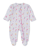 White baby sleepsuit with multicoloured mermaid, seashell, and starfish print, featuring a pink ruffled placket.