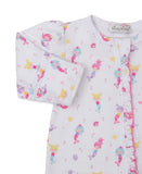 White sleepsuit with multicolor mermaid, starfish, and seashell print. Features long sleeves with cuffs and a pink-edged ruff
