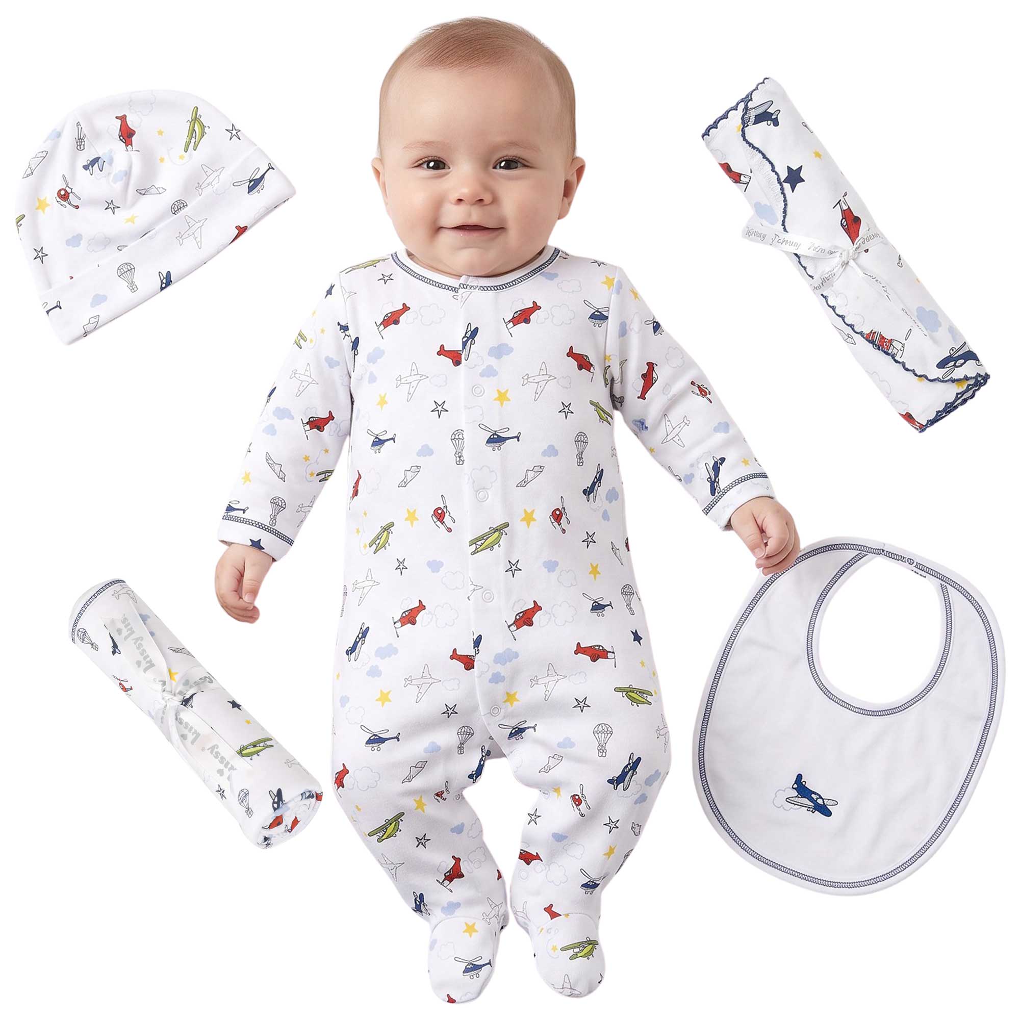 White baby gift set: footed romper, beanie, bib, two burp cloths. Multi-color airplane pattern with blue trim.