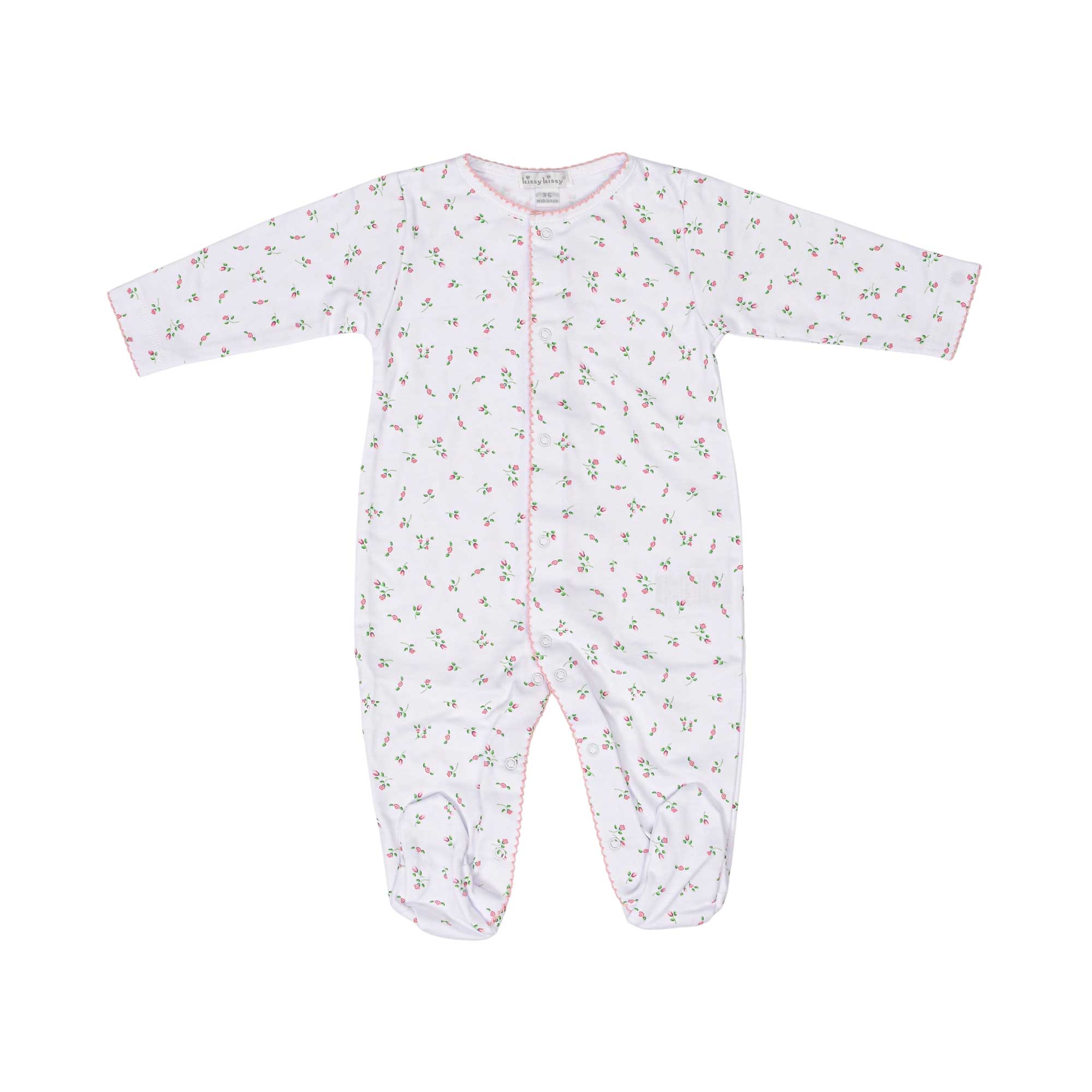 White footed baby sleeper with pink and green floral print, pink scalloped trim on neckline, front snap placket, and footies.