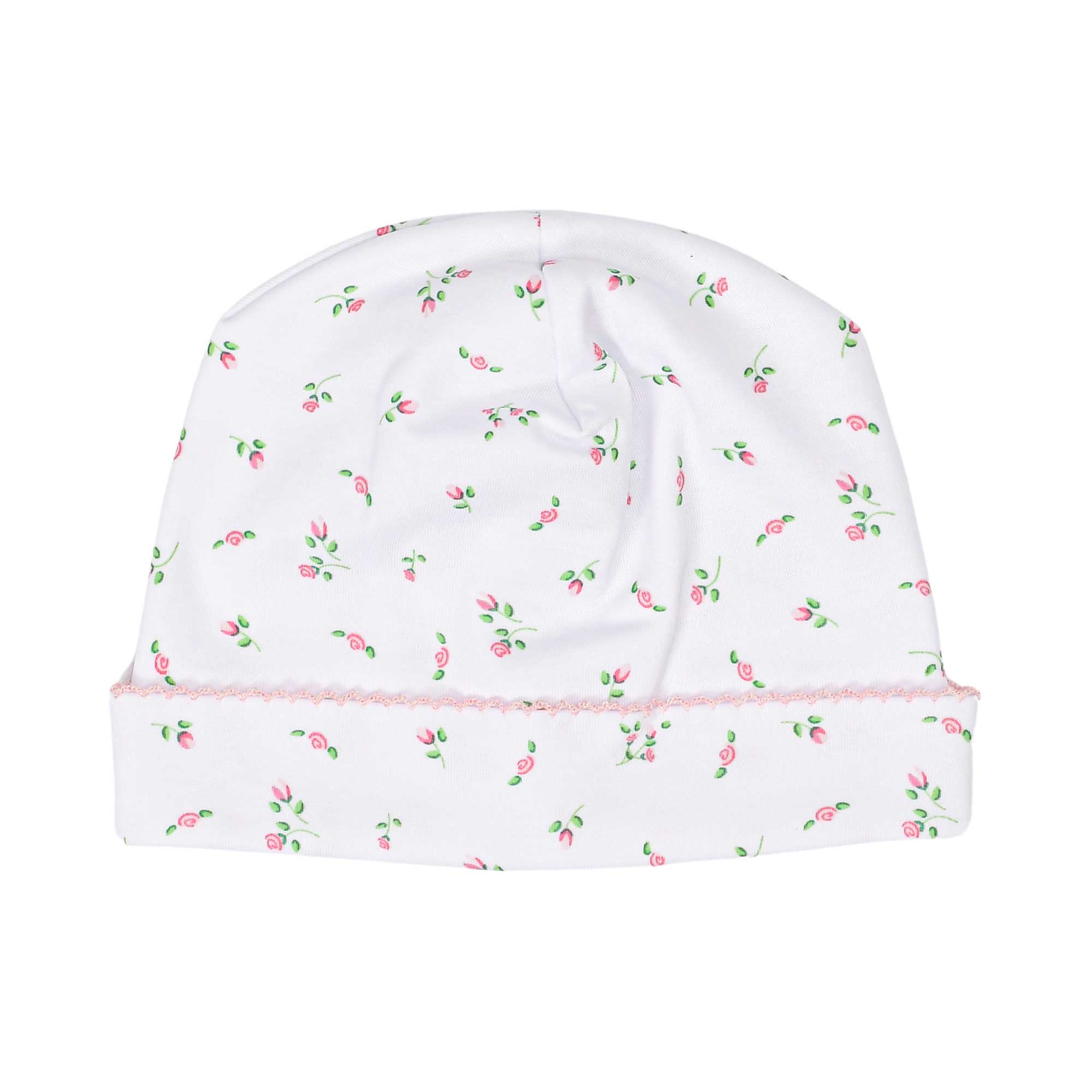 White baby beanie with a pattern of small pink rosebuds and green leaves, featuring a pink scalloped trim on the folded brim.