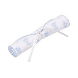 White rolled baby blanket with light blue bear patterns and blue stitched edges, tied with a white 'kissy kissy' ribbon.