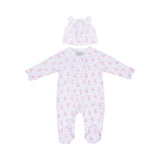 White infant sleepsuit and matching beanie hat with an all-over pink teddy bear pattern and a full-front zip closure.