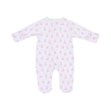 White baby sleepsuit with long sleeves and footed design, featuring an all-over print of small pink teddy bears and dots.