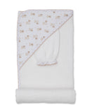 White hooded terry towel with a patterned hood featuring light brown teddy bears and stars, accompanied by a matching wash mi