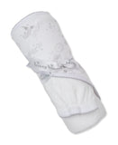 White rolled towel with a top layer of white fabric featuring gray celestial patterns and scalloped trim, tied with a gray "K