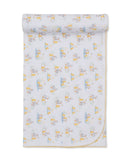 White baby blanket with a repeating pattern of grey ducks and yellow ducklings, featuring a yellow scalloped edge trim.