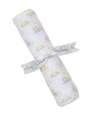 White blanket with multicolor duck and duckling print, yellow scalloped trim, tied with a white "Kissy Kissy" ribbon.