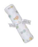 Rolled white blanket with multicolor hot air balloon, animal, cloud, and sun pattern. Features a scalloped trim and is tied w