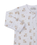 White sleepsuit with tan teddy bear and brown star pattern, long sleeves with ribbed cuffs, and a front zipper.