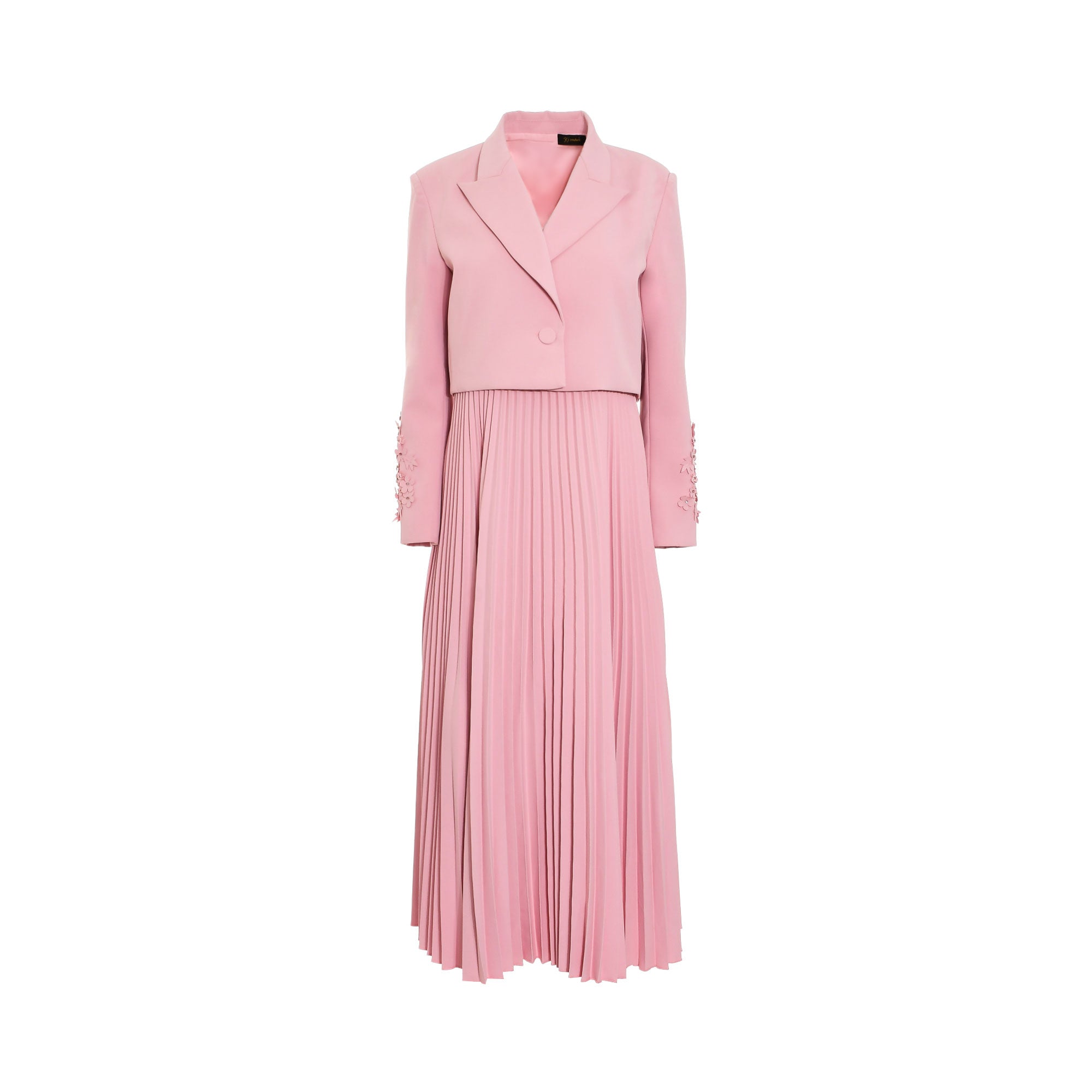 Pink midi dress with a cropped blazer-style top, notched lapels, single button, and floral appliques on long sleeves. The ski