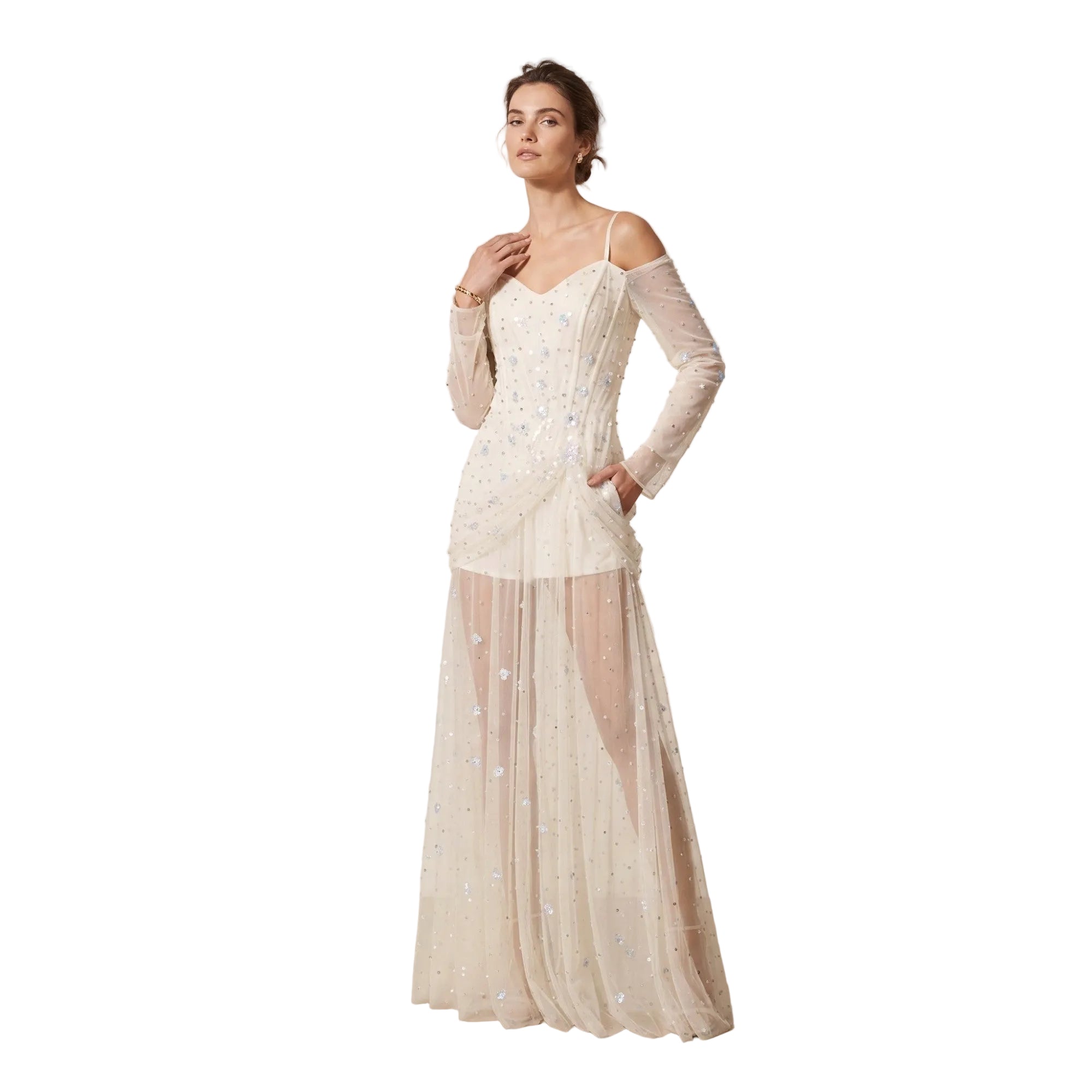 White embellished maxi dress with off-shoulder long sleeves, spaghetti straps, and a sheer overlay skirt.